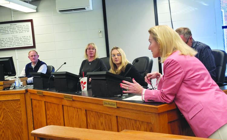 Megan Broome/The Clayton Tribune. Clayton resident Libby Farley tells Clayton City Council members Tuesday afternoon it is important to take the time to make positive changes in the community. Farley said the environmental impact certain projects cause should be considered.