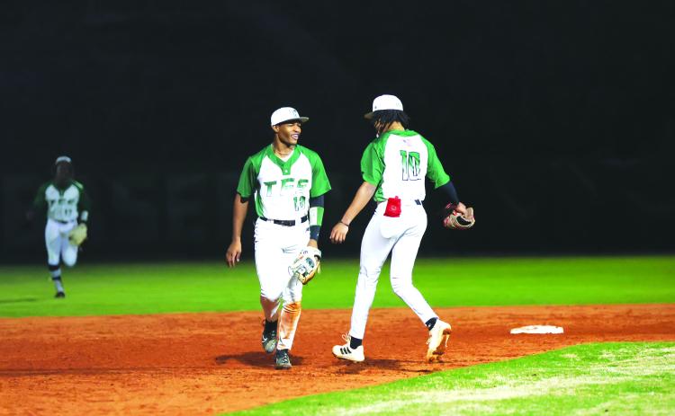 Photo courtesy Austin Poffenberger. Frankey Moree (13) and Rohajae Pinder celebrate after a victory over No. 1 ranked Elbert County on Friday, March 10. The victory was the first win in school history over a top-ranked opponent as the Indians are now 4-6 and 1-2 in the region. TFS next takes on Commerce in a double header on Friday, March 17.