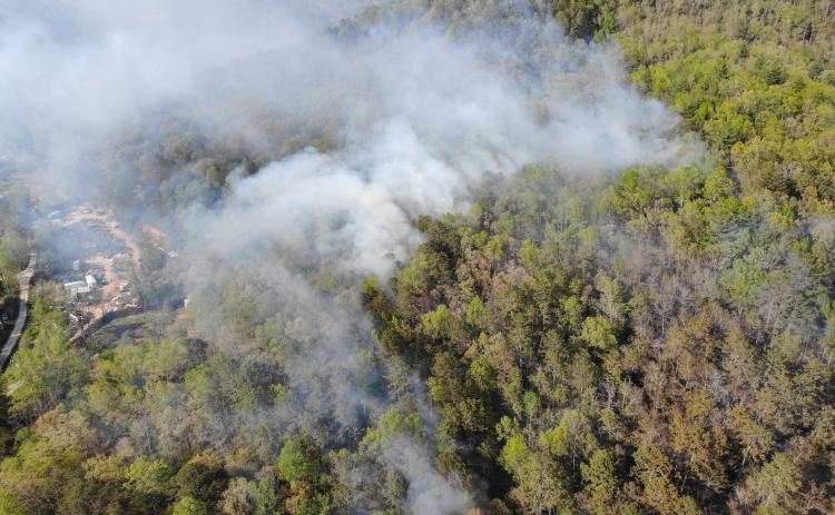Photo courtesy Brian Panell. This aerial view shows a wildfire that started on the shoulder of Bettys Creek Road near Colony Road in Dillard April 19. Multiple agencies responded to the scene and the wildfire burned 9.3 acres.