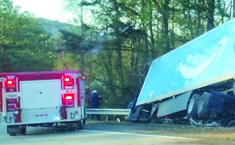 Photo courtesy of Conner Horn. Emergency personnel work the scene of a single vehicle crash involving a semi-truck with an Amazon Prime logo on Ga. 15 just south of McKay Road in Lakemont Monday, April 10. The southbound lane was shut down for a short time as personnel worked the scene.
