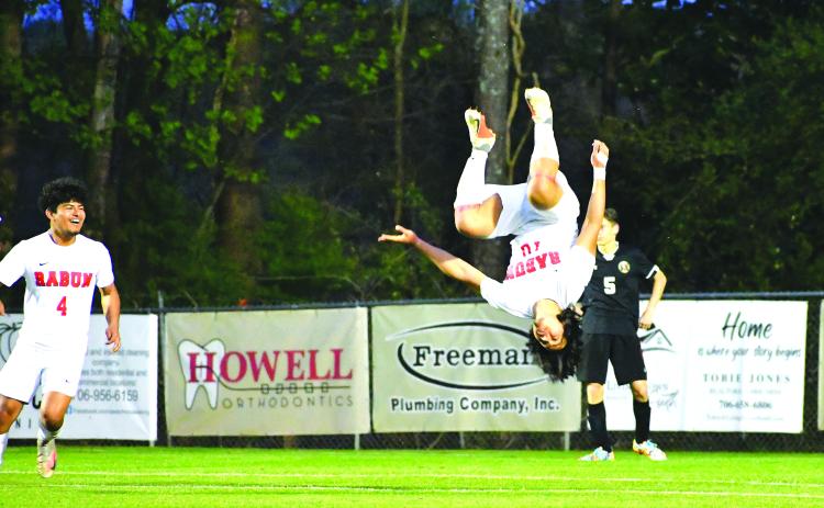 Luke Morey/The Clayton Tribune. Rabun County Wildcat junior Luis Lopez flips in celebration of his third goal against Commerce on Thursday, March 30. The No. 4 seed Wildcats will travel to take on Dalton Academy on Wednesday, April 12.