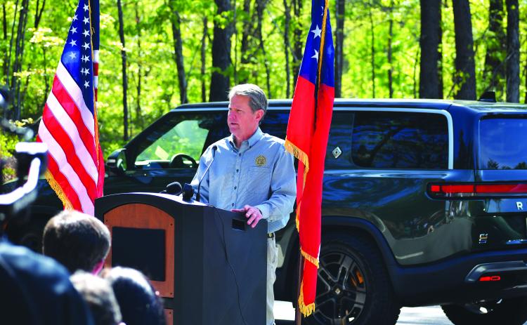 Luke Morey/The Clayton Tribune. Gov. Brian Kemp speaks at Tallulah Gorge State Park about a program that adds electric vehicle chargers Thursday, April 20.