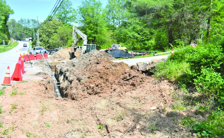 Megan Broome/The Clayton Tribune. Mack Jones Enterprises, out of Flowery Branch, Ga., works with City of Clayton Public Works on Old Highway 441 in the area of Hillside Drive and Summit Drive in Clayton on infrastructure repairs for better water quality and fire protection. Motorists are asked to use caution and slow down while workers are in the area.