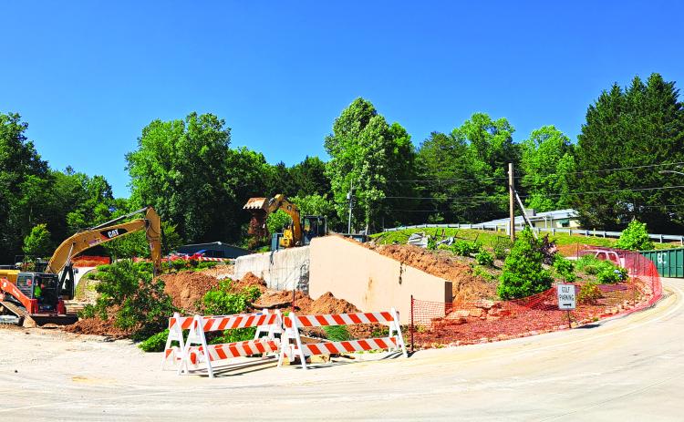 Tom Adams Construction, of Rabun Gap, works to demolish the Rabun County Golf Club building. Demolition is underway after the strength of the building was compromised following a Dec. 23, 2021, structure fire. The building will be built back similarly with the golf carts relocated to the maintenance shed.