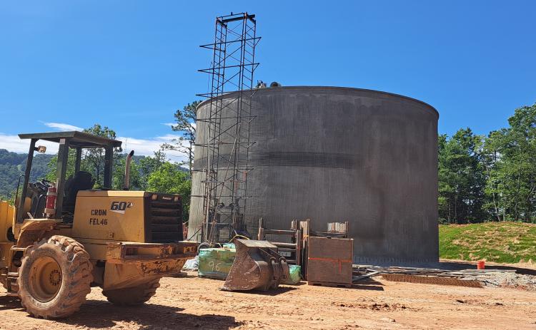 Megan Broome/The Clayton Tribune. Crews continue work on construction of the 750,000 gallon ground-level water storage tank located on Yorkhouse Road in Rabun Gap. It is scheduled to be completed and on line in late September-early October 2023, with a 90-day function testing period to follow.