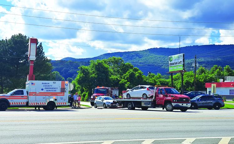 Megan Broome/The Clayton Tribune. Both vehicles were towed away following a two-vehicle crash at Ramey Boulevard June 5 that resulted in minor injuries.