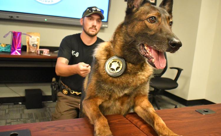Megan Horn/The Clayton Tribune. K9 Deputy Jorka is officially retired after six years of honorable service at the Rabun County Sheriff’s office. She is 8-years-old and pictured with partner Cpl. Clinton Scott at her retirement reception held Sept. 8.