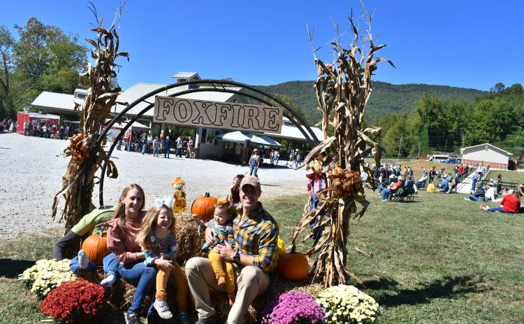Megan Horn/The Clayton Tribune. Tory and Megan Holton enjoy their family time at the Foxfire Mountaineer Festival with Anniston, 5, and Avery, 1, last Saturday. The annual event was held in downtown Clayton at the pavilions.