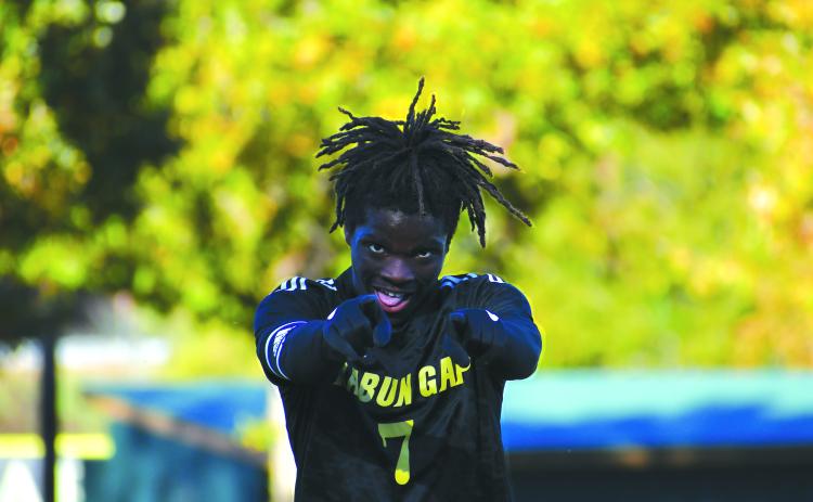 Wade Cheek/The Clayton Tribune. Eagle senior Winfred Sarpong and his RGNS soccer teammates are set to defend their title on Saturday against the No. 1 team in the NCISAA, Wesleyan Christian Academy.