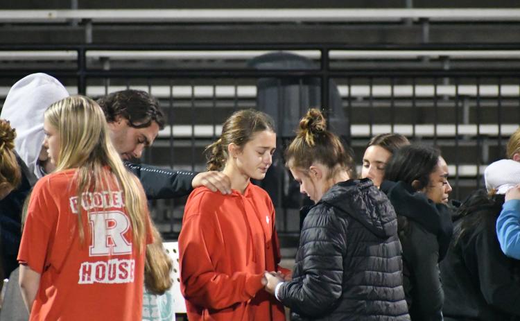 Wade Cheek/The Clayton Tribune. Rabun County middle and high school students join together for a time of prayer during the Oct. 25 “Fields of Faith” at Frank Snyder Memorial Stadium. This was the first time Rabun County and The Fellowship of Christian Athletes has hosted a “Fields of Faith” event.