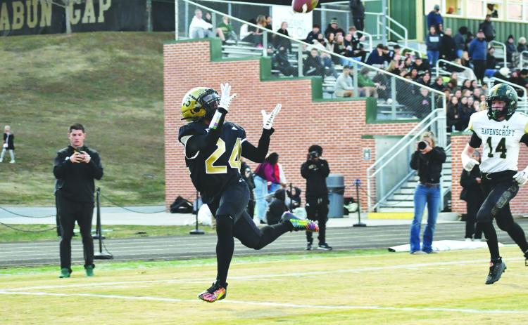 Wade Cheek/The Clayton Tribune. RGNS wide receiver Natey Fom cradles in a wide-open touchdown catch to extend the Eagles lead in last Friday’s first round of the tourney.
