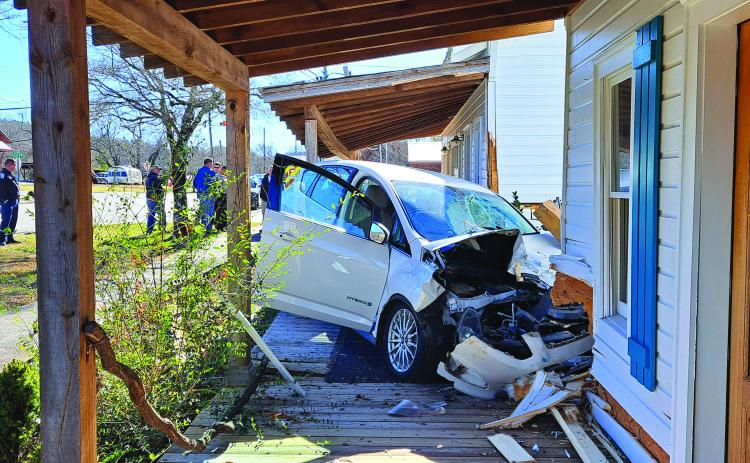 Megan Horn/The Clayton Tribune. A female driver reportedly exited the roadway in Tiger when she had a “medical episode.” The vehicle struck multiple buildings near the Tiger Connector intersection.