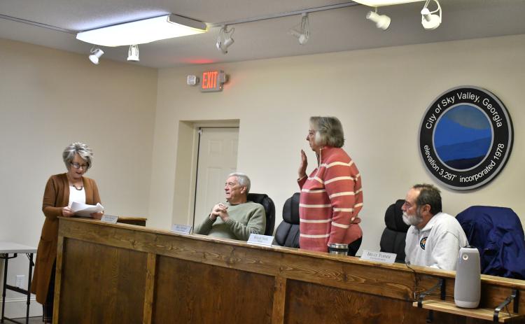 Megan Horn/The Clayton Tribune. Sky Valley Mayor Hollie Steil takes the oath of office given by City Clerk Karen Fleming at Tuesday’s city council meeting.