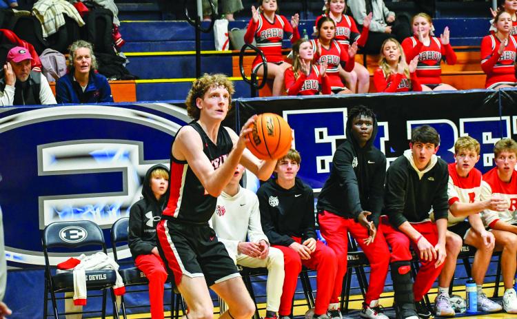 Wade Cheek/The Clayton Tribune. Wildcat Hayes Free lines up his shot against Elbert County.