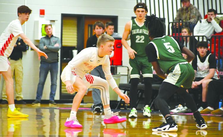Wade Cheek/The Clayton Tribune. RCHS hoops freshman Landan Bedingfield guards the perimeter during a Feb. 9 matchup between the Wildcats and the Tallulah Falls School Indians. The 72-57 victory gave RCHS a top-spot in the region, tied with Athens Christian.