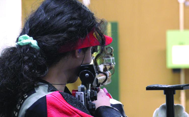 TFS Athletics. TFS marksman and Junior Olympic Qualifier Brianna Walter lines up a shot during the GHSA semifinals against Kendrick on Feb. 29.