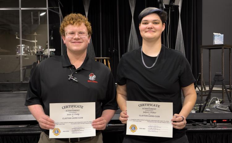 Pictured are 12th Grade Scholars Issac A. Craig and Jalyn L. Fisher. Not pictured are Quetzaly Diaz Ordaz; Molly E. Mazarky; Molly A. Upchurch; Itzia A. Vasquez Ramos.