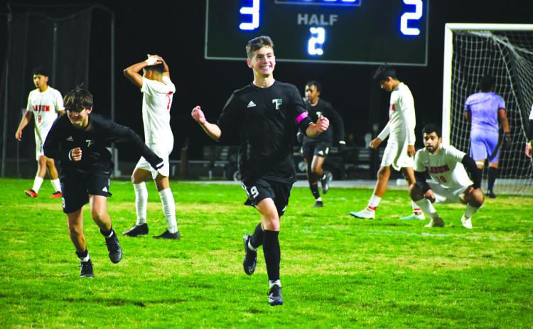Wade Cheek/The Clayton Tribune. Austin Ball, a first-team all-state member, celebrates after scoring a goal in the 2023-2024 season.