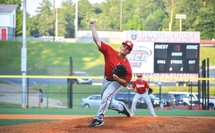 Wade Cheek/The Clayton Tribune. Wildcat newcomer Lake Evans extends off the mound to deliver a pitch on Thursday, June 13, when the RCHS baseball team took down East Jackson 7-2 in a summer ball game.