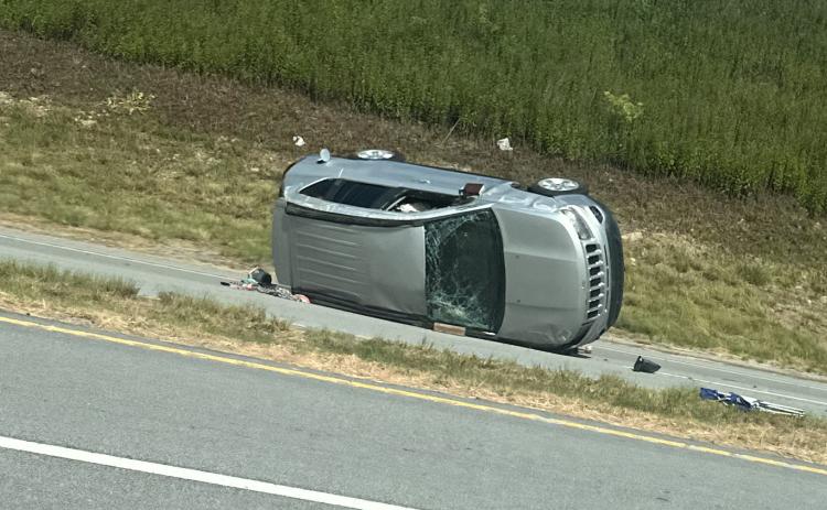 Katie Hamby/The Clayton Tribune. A crash involving two Jeeps at the intersection of Ga. 15 and Stekoa Falls Road just outside of Clayton city limits June 21 resulted in serious injuries. Pictured is the silver 2014 Jeep Compass Sport involved, which overturned and came to an uncontrolled rest on its passenger side facing southbound.