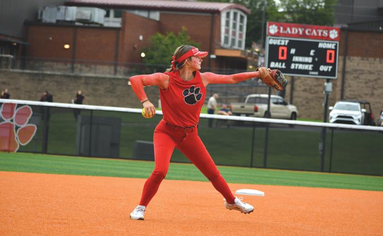 Wade Cheek/The Clayton Tribune. Senior infielder Jacie McCall gets ready to fire a throw over to first base to record an out in the Lady Cats’ scrimmage earlier this season.