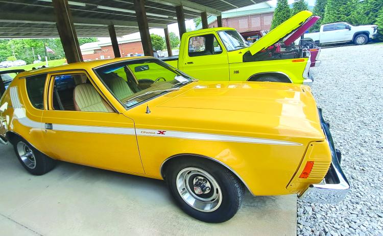 Megan Horn/The Clayton Tribune. This yellow 1974 AMC Gremlin with a 258 6 cylinder engine has its original interior and is owned by Brucz Richter. It was featured at last weekend’s Rockin’ Mountain Motor Show.