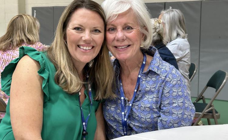 Submitted photo. Michelle Waldrip and her CBS Core Leader, Mary Boland, share a joyful moment at the 2024 Community Bible Study May luncheon.