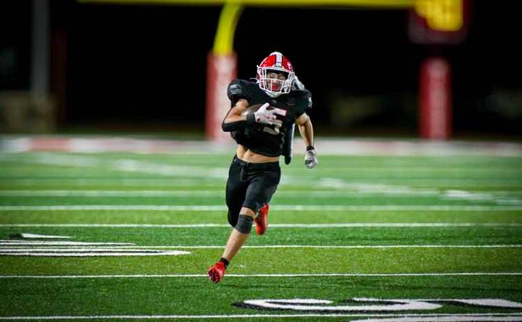 Wade Cheek/The Clayton Tribune. Junior running back Reid Giles sprints to the end zone for a Wildcat touchdown during Rabun County’s win over Dalton. Giles and the Wildcats are now 2-1 on the season.