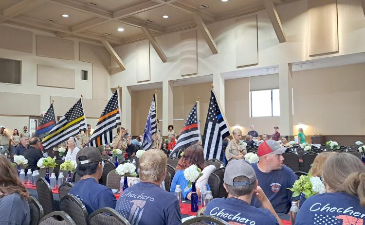 Megan Horn/The Clayton Tribune. Boy Scouts of America Troops 6 and 19 present the flags representing each branch of public safety including law enforcement; EMS; fire; dispatch; corrections; and search and rescue during the second annual Rabun County First Responder Appreciation Dinner on Aug. 30.