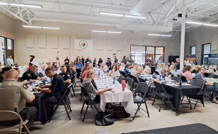 Megan Horn/The Clayton Tribune. Numerous leaders in the community including officials, law enforcement, church leaders, nonprofit representatives and many others in Rabun County and the region came together to learn more about how to prevent violence at the Stopping Violence Breakfast on Aug. 29. The Community Room at the Food Bank of Northeast Georgia was filled with attendees.
