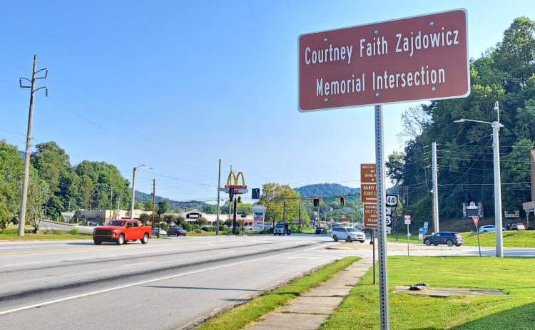 Megan Horn/The Clayton Tribune. Signage is displayed at the Walgreens intersection recognizing the area as “Courtney Faith Zajdowicz Memorial Intersection.” Another sign is displayed at George Eller Curve that reads, “In Memory Of Courtney Faith Zajdowicz DUI Victim September 1, 2021.” Below: Photo submitted.