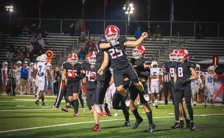Wade Cheek/The Clayton Tribune. Senior Tucker Buchanan celebrates a fumble recovery during Rabun County’s 48-14 win over Oglethorpe on Friday, Oct. 11. RCHS is now 6-2 and 3-1 in region play and will be away at Athens Academy on Oct. 25.