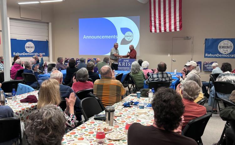 Submitted. Rabun County Commissioner Kent Woerner is welcomed to the Rabun County Democrats Oct. 14 meeting and speaks about the upcoming Special Purpose Local Option Sales Tax (SPLOST). A crowd of over 70 people attended the meeting.