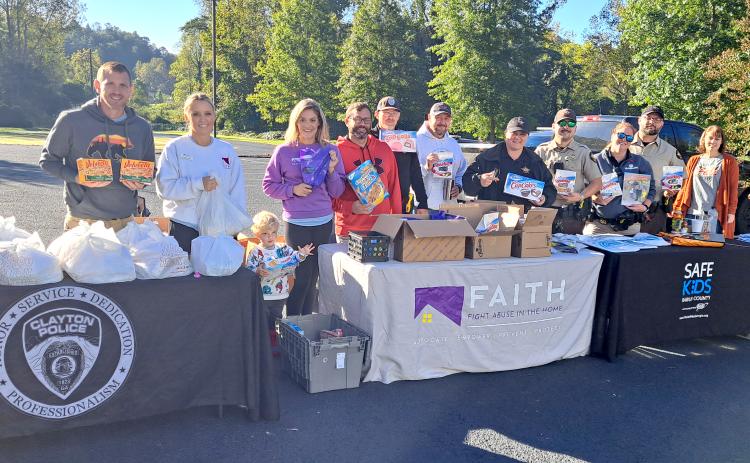 Megan Horn/The Clayton Tribune. The Clayton Police Department, Rabun County Sheriff’s Office, and Fight Abuse In The Home (F.A.I.T.H.) along with the Food Bank of Northeast Georgia, faith-based organizations and churches distributed food and literature as a way to build connections with the community during Faith & Blue weekend on Saturday, Oct. 12. Below: Submitted photo. The Clayton Police Department and nonprofit Fight Abuse In The Home (F.A.I.T.H.) held a blood drive in the community on Friday, Oct. 11.