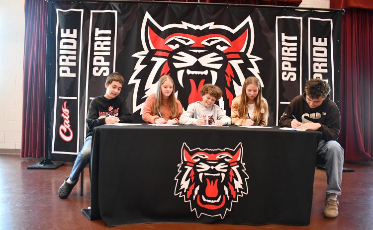 Megan Horn/The Clayton Tribune. Rabun County Schools 2024-2025 REACH Scholars are Mason Beck, Danika Crane, Jessa Gipson, Everett Goodrow and Brayden Wood. The students were honored and had their scholarship signing ceremony on Nov. 21 in the Rabun County High School Fine Arts Building Band Room among family, friends, community supporters and school administrators.
