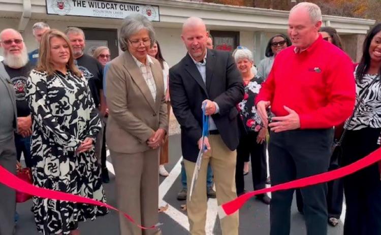 Photo courtesy of Forward Rabun/Rabun County Chamber of Commerce. Community members celebrate as Forward Rabun/Rabun County Chamber of Commerce cut the ribbon on The Wildcat Clinic at the Rabun County Board of Education complex. The clinic opened on Oct. 7.