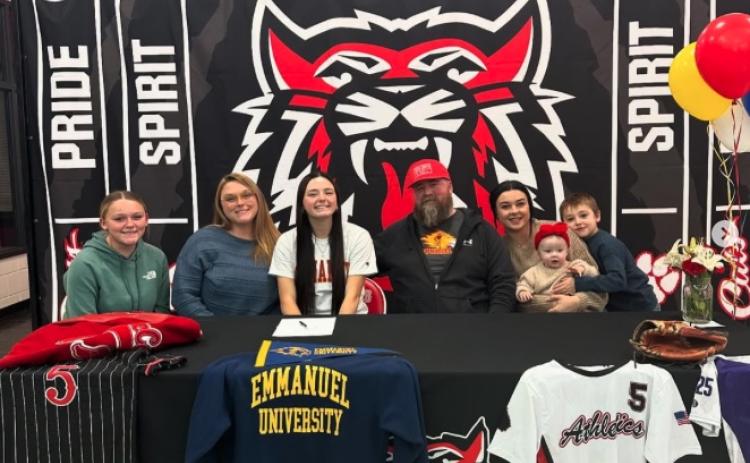 Wade Cheek/The Clayton Tribune. RCHS senior softball and basketball player Jacie McCall recently signed her NLI to play softball at the collegiate level with Emmanuel University in Franklin Springs.