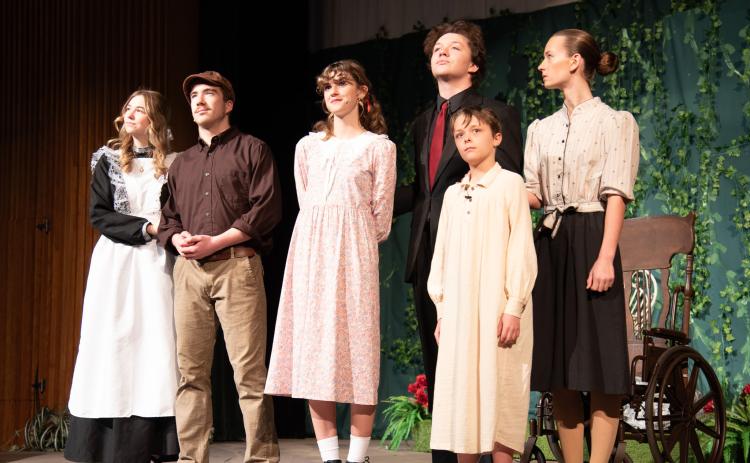 Photos courtesy Tallulah Falls School. Lizzy Wanner, Charlie Harris, Olivia Bonner, Jamie Griffith, Turner Lander, and Katie Anderson stand together in solidarity at the close of “The Secret Garden.”