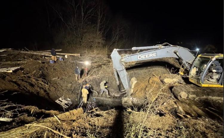 Submitted photo. Rabun County Water and Sewer Authority (RCWSA) employees spent 12 hours and worked throughout the night on Feb. 13 to restore water service after a 10-inch ductile iron water line was cut by a Georgia Department of Transportation contractor.