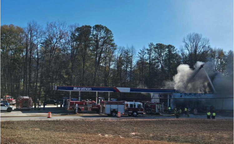 File Photo submitted by Megan Morris. Firefighters from Rabun County Fire Services Stations 5, 1, 6, 9, 12 as well as Otto (N.C.) Fire and Rescue work to extinguish a commercial structure fire at 6676 Highway 441 North (Marathon station) in Dillard on Saturday, Dec. 7, 2024. The building is a “total loss.”