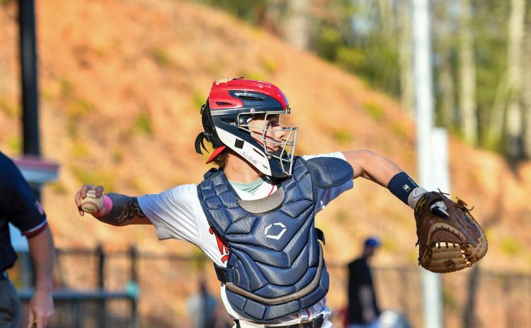 Wade Cheek/The Clayton Tribune.  Junior catcher Noah English throws down to second base in Rabun County’s 3-2 loss to Banks County on Tuesday, March 11.