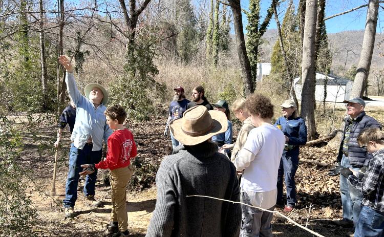 Submitted photo. Headwaters Master Gardeners, Boy Scout Troop 6, Chattooga Conservancy, and other Clayton citizens worked to remove invasive species and clean up Stekoa Creek Park on Sunday, March 2.
