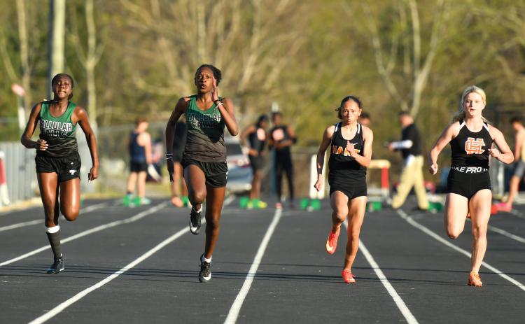 Wade Cheek/The Clayton Tribune. The Tallulah Falls School girls track and field team had five Lady Indians finish within the top 10 of the girls 100-meter dash event at Stephens County High School on Thursday, March 27.