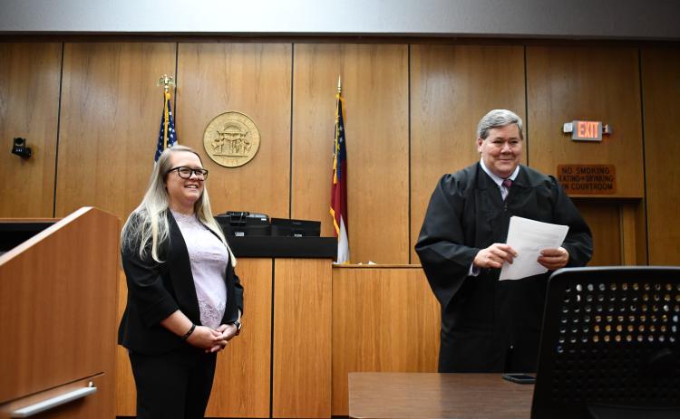 Megan Horn/The Clayton Tribune. Savannah Dixon is sworn in as Rabun County Probate judge to fill the unexpired term of Judge Carlton H. “Hobie” Jones, III, who was recently appointed by Gov. Brian Kemp and sworn-in as a Superior Court judge. Dixon took the oath before Mountain Judicial Circuit Superior Court Judge William R. “Bill” Oliver.