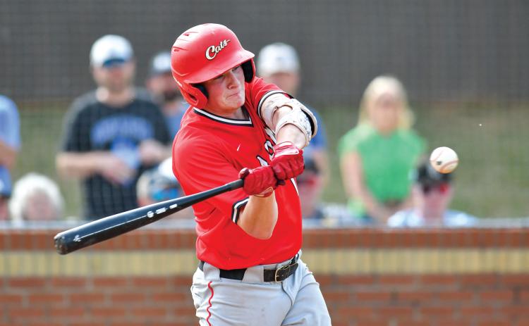 Wade Cheek/The Clayton Tribune. Senior first baseman Elvis Hunt cracks a double during Rabun’s playoff series with Bremen last Friday, April 25. The Wildcats lost 7-6 and 5-4, ending their season in the first round of the playoffs.