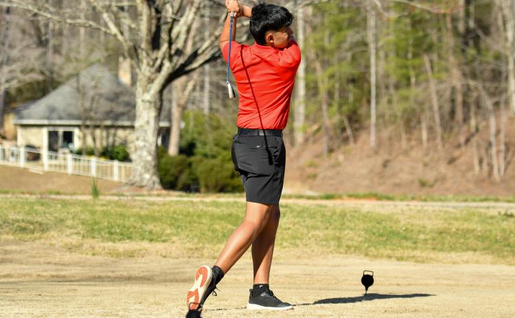 Wade Cheek/The Clayton Tribune. RCHS golfer Roberto Diaz won this year's area tournament as the top individual with a 74 on the score card.