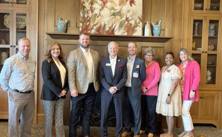 Submitted photo.  State Sen. Bo Hatchett and Rep. Chris Erwin recently spoke on topics addressed during the 2025 session of the General Assembly at the annual Toccoa-Stephens County Post Legislative Coffee at the Currahee Club. Pictured (from left) are Chamber board member Phil Hobbs, chamber chair Lisa Lawson, Hatchett, Erwin, Chamber board member Van Loskoski, Chamber board member Anne Shurley, Chamber vice chair Cassandra Wilkins, and Chamber president Julie Paysen.