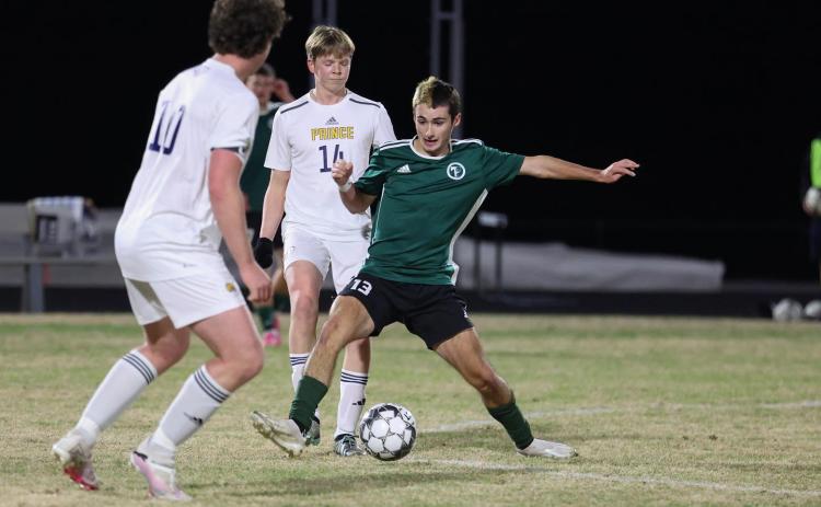 TFS Athletics. Senior Landon Hall fights for possession during a matchup last season against Prince Avenue Christian. The Indian soccer team will play in the Final Four of the GIAA AAAA state tourney on Saturday.