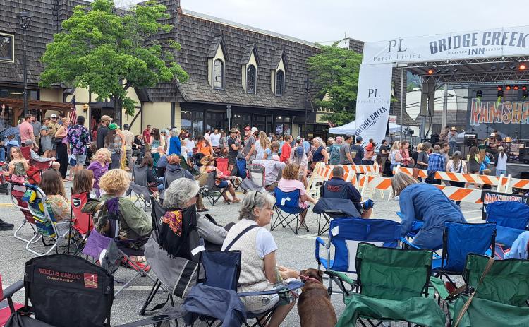 File/Megan Horn/The Clayton Tribune. Crowds of people dance and sing to the music of Scott Low & The Blue Bouillon during last June’s Ramshackle event in downtown Clayton. This year’s June 7, 2025, second annual event features a lineup of different music genres.
