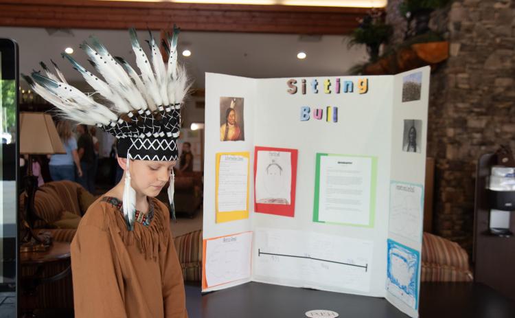 Photo courtesy of Tallulah Falls School. Gage Freeman is ready for visitors to stop by and learn about Sitting Bull at the Tallulah Falls School fourth-grade wax museum. This is the second year the fourth grade has had students participate in the event.